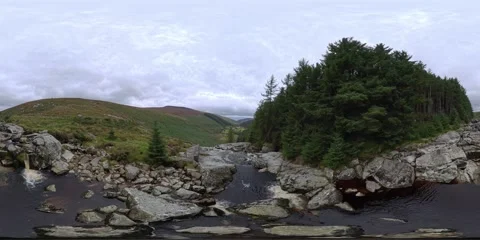 Flight from Glenamcnass waterfall to the valley Stock Footage 345608999