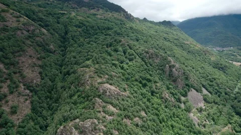 The flight at the height of the peaks shows the power of nature. Stock Footage 158794528