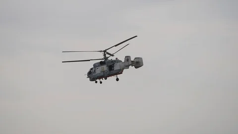 The flight of the helicopter with two screws. Movement through the air machines  Stock Footage 120703587
