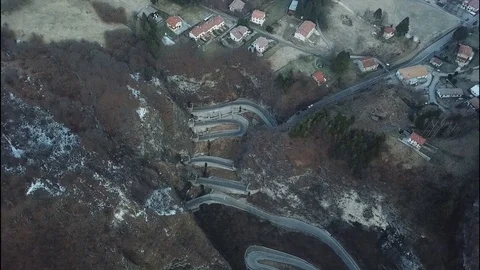 Flight high above San Boldo pass in Italy Stock Footage 113826010