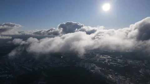 Flight high in the fluffy clouds sunny Stock Footage 142939067