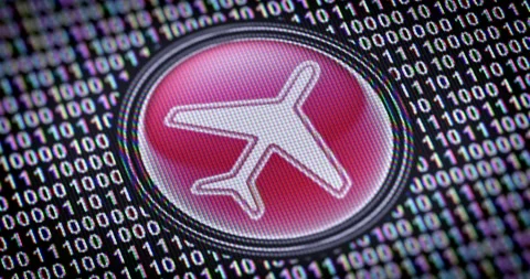 Flight icon. Binary code ( array of bits ) in the screen. Looping footage Stock Footage 111234311