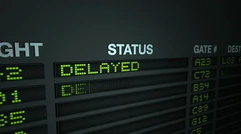 Flight Information Board at Airport - Delayed Stock Footage 9885753