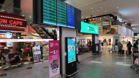 Flight information display screen and commercial ads inside Stock Footage 340939488