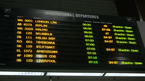 Flight information at a timetable at Henri Coanda Airport in Otopeni Stock Footage 54074677