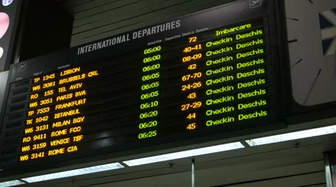 Flight information at a timetable at Henri Coanda Airport in Otopeni Stock Footage 54074688