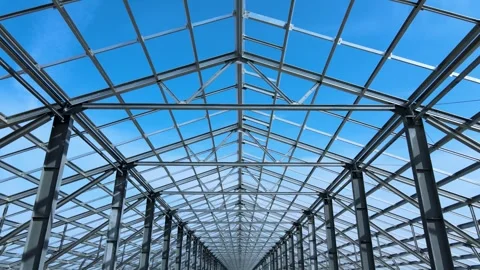 Flight inside the construction of a large metal structure in agricultural area Stock Footage 306300512