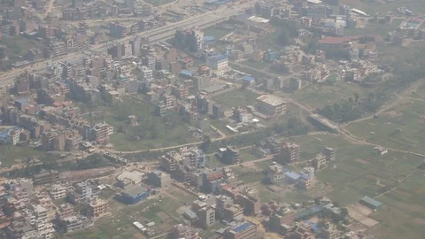 Flight leaving Kathmandu out plane window Stock-Footage 101442877