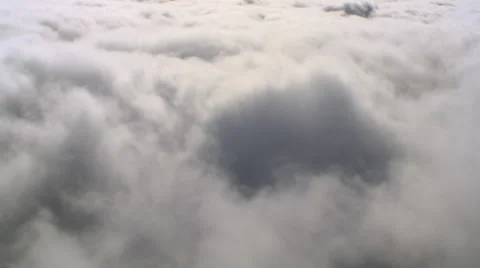 Flight to left through close-up clouds Stock Footage 59451436