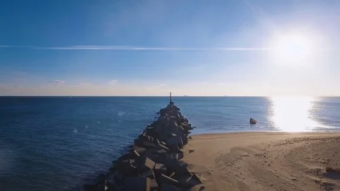 The flight to the lonely lighthouse in the ocean . Leading beacons. 4K. Stock Footage 71019674