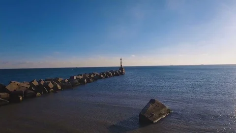 The flight to the lonely lighthouse in the ocean . Leading beacons. 4K. Stock Footage 71019967