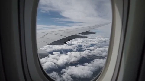 In-Flight Lufthansa 747 Jumbojet Wing View (zoom through window) Video stock 83183384