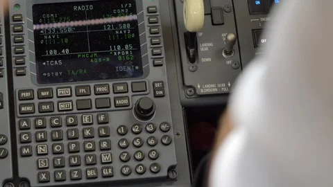 Flight Management System FMS instrument in cockpit of private jet Stock Footage 105761369