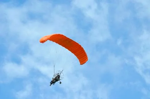 Flight of a motor paraplan Stock Photos