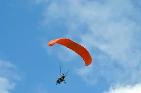 Flight of a motor paraplan Stock Photos