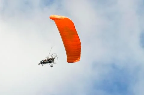 Flight of a motor paraplan Stock Photos
