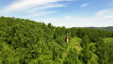 Flight to the mountain, the old lighthouse. Stock Footage 240995813