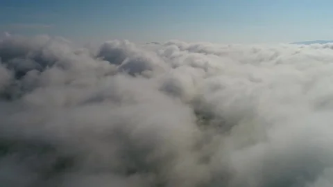 Flight in mountains like bird through clouds. Stock Footage 83760957