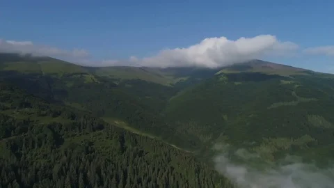 Flight in mountains like bird through clouds. Stock Footage 83761322