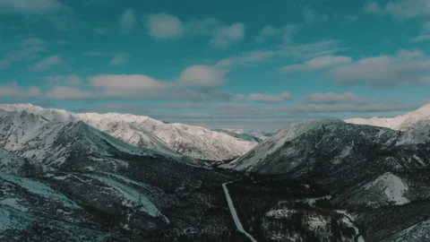 Flight in the mountains. Birds in the sky above the mountains. Mountain colors. Stock Footage 196093239