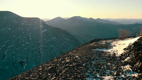 Flight in the mountains. Birds in the sky above the mountains. Mountain colors. Stock Footage 196105506