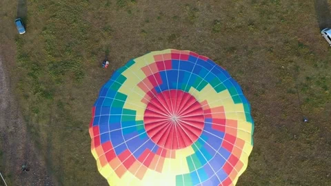 Flight of a multicolored balloon. Shooting from a drone Stock Footage 207518121