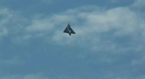 Flight of NATO fighter Dassault Mirage 2000 in skies of Russia. MAKS-2005 Stock Footage 195477610