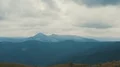 The flight near the four active people in the mountain 4k or 4k+ Resolution
