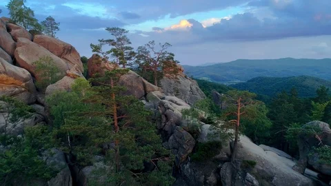 Flight near High cliffs surrounded by dense forest. A nature wonder Trees Stock Footage 94744916