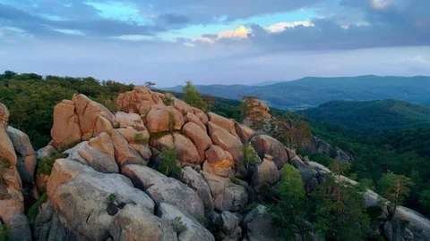 Flight near High cliffs surrounded by dense forest. A nature wonder Trees Stock Footage 94744968