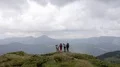 The flight near hikers on a picturesque mountain 4k or 4k+ Resolution