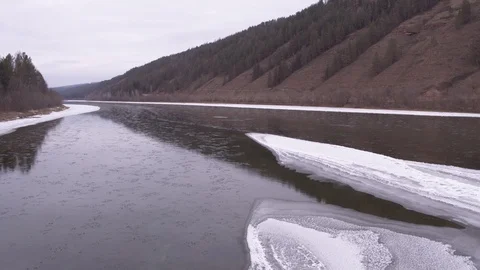 Flight near ice in Lena river 스톡 동영상 123710003