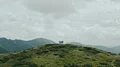 The flight near a mountain with four hikers 4k or 4k+ Resolution