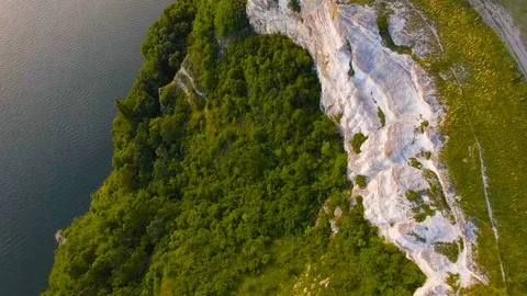 Flight near the rocks of sunset Stock Footage 77190475