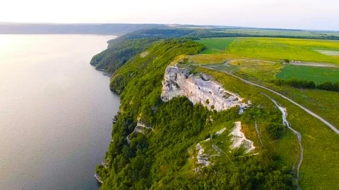 Flight near the rocks of sunset Stock Footage 77198143