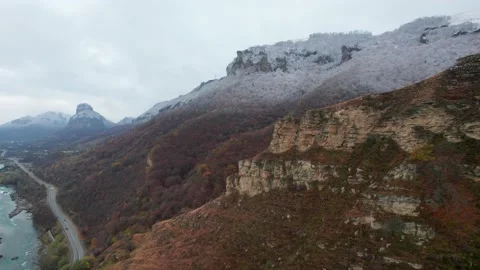The flight next to the rocks along the gorge covered with autumn colors Stock Footage 170728600