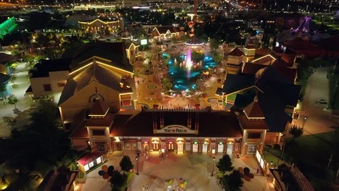Flight night backlight Sochi theme amusement park Russia castles carousel People Stock Footage 122226768