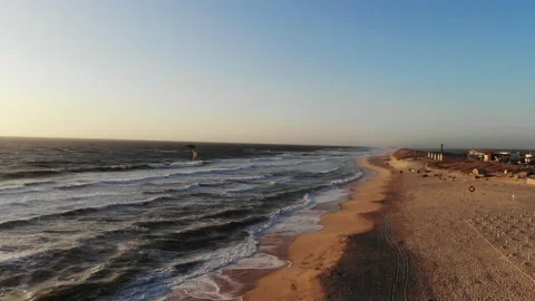 Flight on the ocean sandy shore in the early morning, Portugal, Furadouro. Stock Footage 152851118