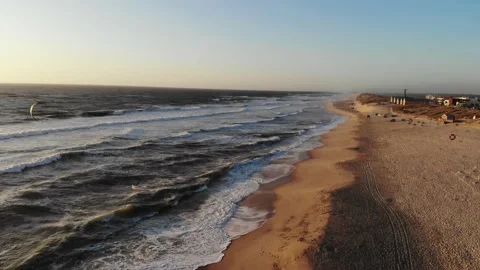 Flight on the ocean sandy shore in the early morning, Portugal, Furadouro. Stock Footage 172136825