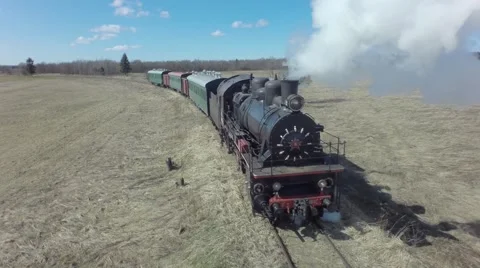 Flight with Old steam train in front Video stock 54413185