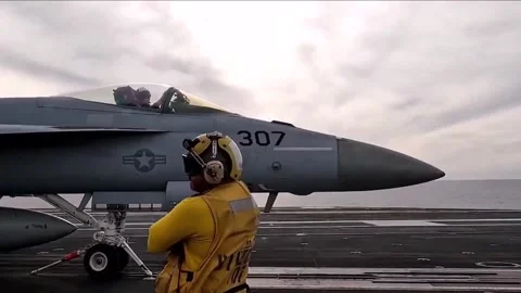 Flight Operations Aboard Aircraft Carrier. Floating Air Base in The Sea  (17 Stock Footage 253335357