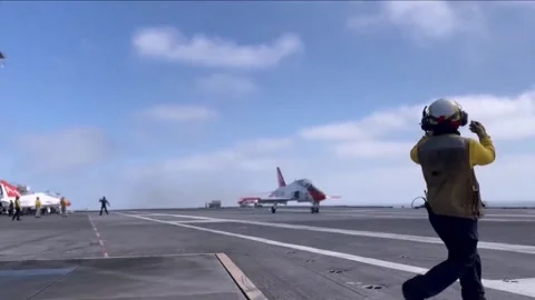 Flight Operations Aboard Aircraft Carrier. Floating Air Base in The Sea  (32 Stock Footage 253335987