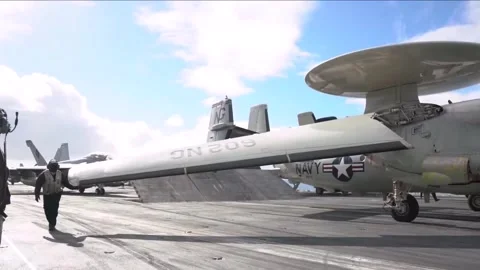 Flight Operations Aboard Aircraft Carrier. Floating Air Base in The Sea  (45 Stock Footage 253336568