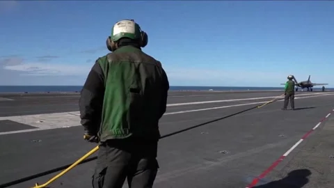 Flight Operations Aboard Aircraft Carrier. Floating Air Base in The Sea  (50 Stock Footage 253336755