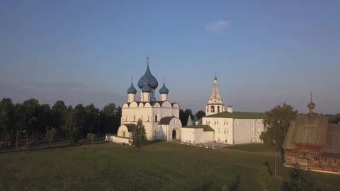 Flight over the architectural ensemble of Suzdal Kremlin with Cathedral of the Stock Footage 94080549