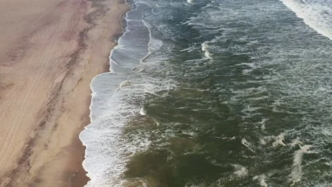 Flight over the Atlantic ocean on Skeleton Coast Stock Footage 157830243