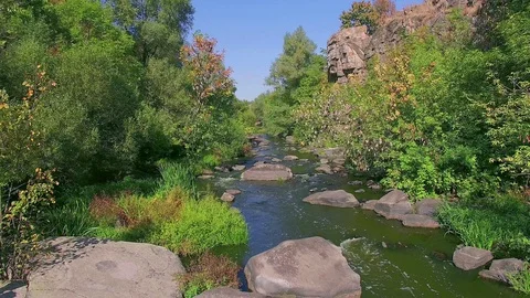 Flight over the autumn mountain river Stock Footage 99513561