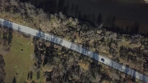 Flight over the autumn river, road and the railway Stock Footage 81003688