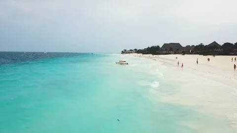 Flight over azure ocean with sailing boat swing on waves Stock Footage 91801011