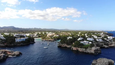 Flight over the bay of Cala D'or and Cala Ferrera in Mallorca Stock Footage 95530705
